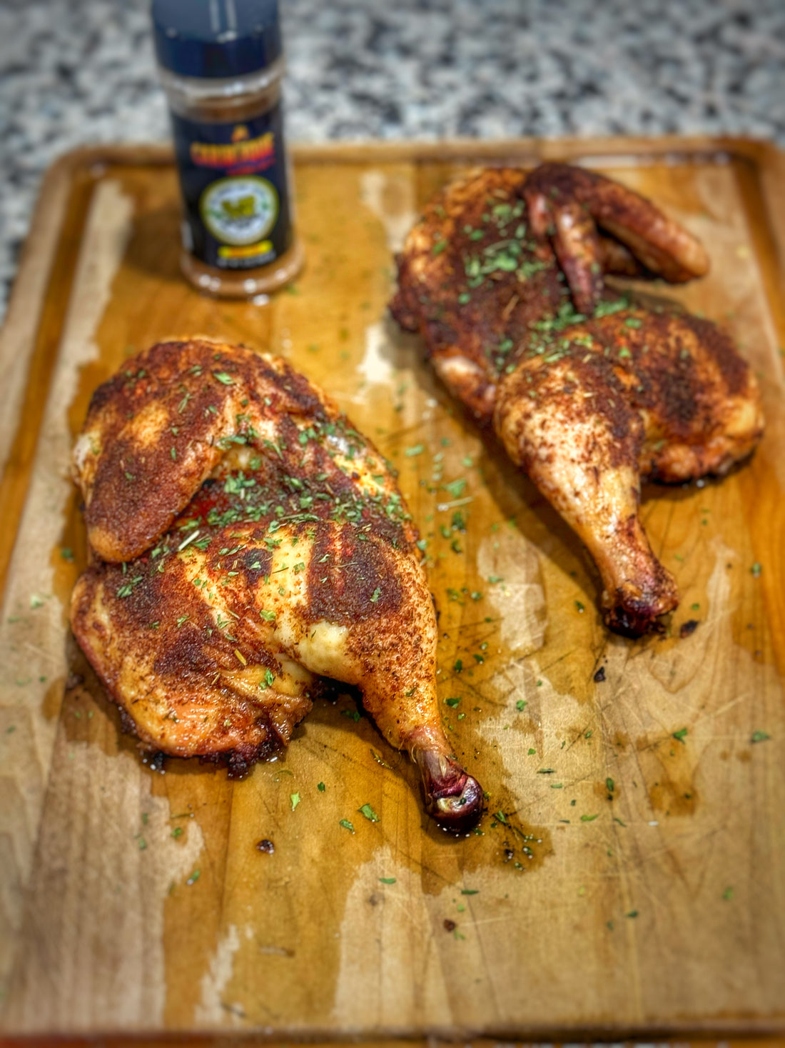 Smoked chicken halves on your Kamado Joe